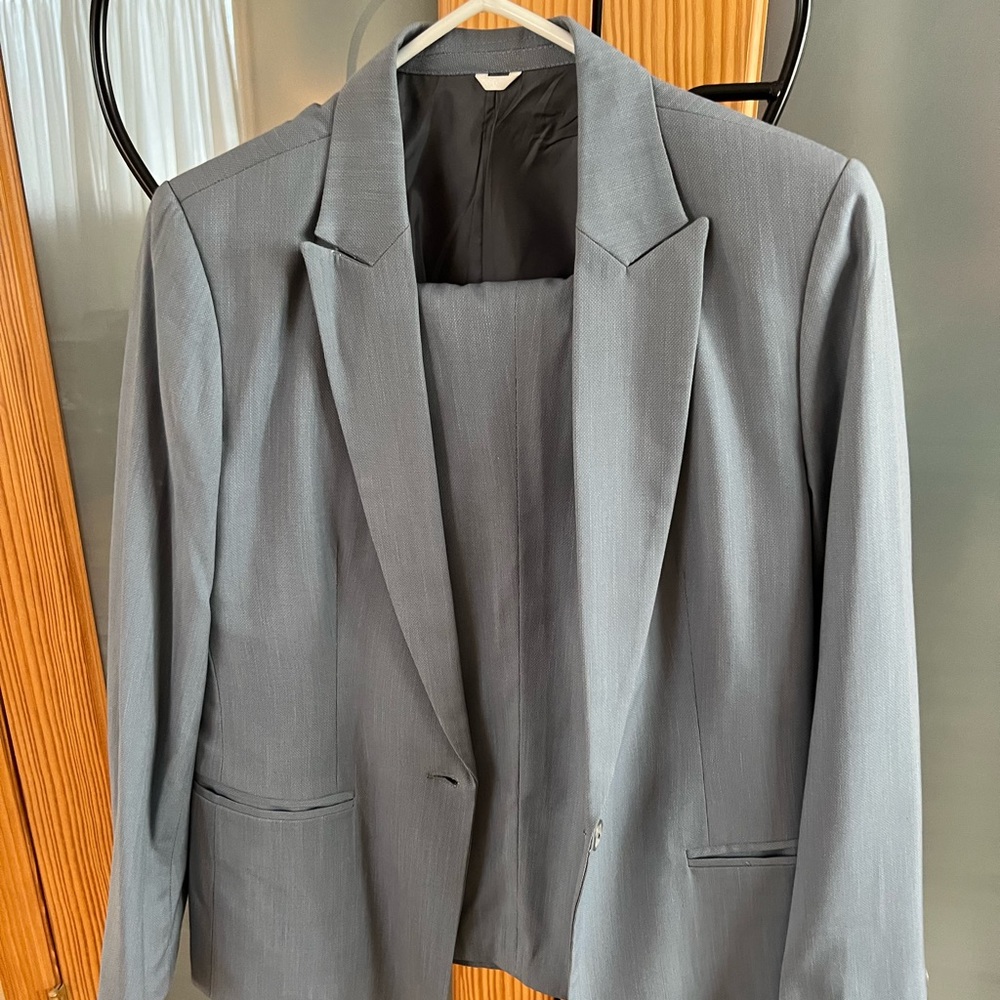 Light blue woman business suit